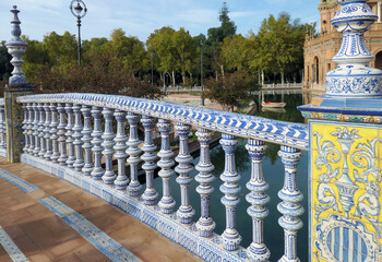 Majolica bridge railing in Maria Luisa Park in Seville, Spain, 2024.