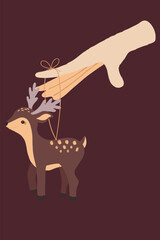 Flat hand drawn sketch of hand keeping Christmas toy deer . The decoration is hanging on the index finger.