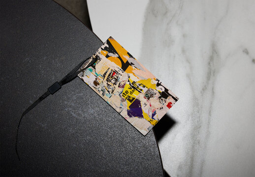 Minimalist Cloth hang Tag on a Black Table Surface
