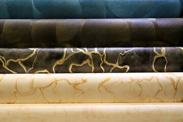 Rolls of vinyl wallpaper for finishing walls. Wallpapers with abstract patterns for the wall.