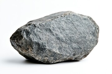 Obraz premium Rugged Gray Stone on White Background. Closeup of Solid Rock, Heavy and Rough, Isolated for Natural Symbolism.