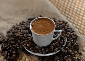 traditional Turkish coffee cup and coffee beans