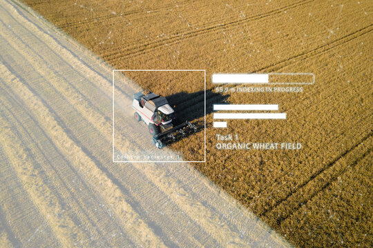 Harvester on field, crops growing efficiency with AI Data analysis technology. Futuristic Agriculture Concept of Computerized, Eco, Sustainable way of Harvesting