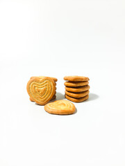 Stack of biscuit crackers. Four different shapes with sugar isolated on a white background