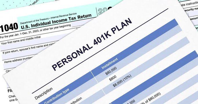 Retirement plan 401k and tax form 1040, pension savings planning, view from above, close-up footage