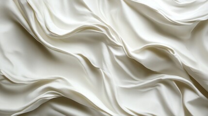 Obraz premium Soft white silk cascades elegantly with intense texture, highlighting the interplay of light and shadow. The fabric's smooth surface emphasizes its luxurious quality and intricacy, inviting touch