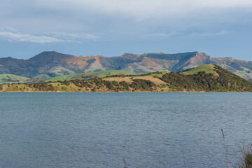 Obraz premium Picturesque Panorama of Mountainous Terrain and Lake