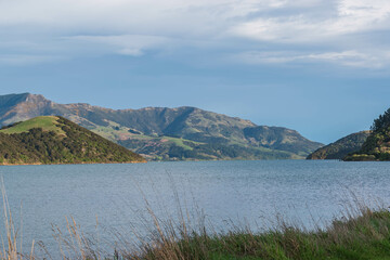 Fototapeta premium Majestic Mountain Range Reflected in Calm Lake Waters