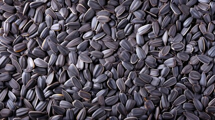 Hulled Sunflower Seeds Textured Background Close-Up. Concept of Healthy Eating, Natural Snack, Seed Variety, Nutrition, Vegan Food, and Dietary Fiber