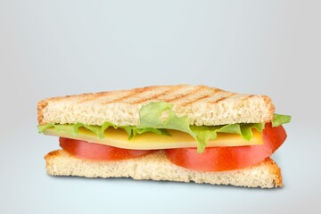 Tasty fresh sandwiches with vegetables on the desk