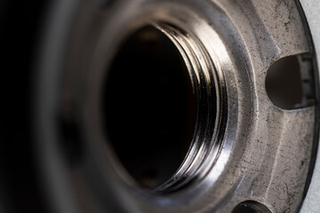 details of a replaceable metal filter for cleaning engine oil in a car