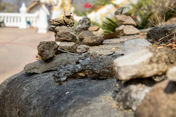 The piles of pebbles were arranged deliberately.