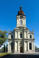 Obraz premium A protestant reformed church in Morges, Switzerland, a tall clock tower and classical architecture