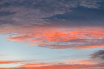 Sunset with beautiful rain clouds drifting across the sky
