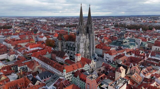 Discover the stunning aerial view of Regensburg, a historic and cultural city in Bavaria, Germany, known for its iconic architecture and vibrant, colorful rooftops that enhance its skyline
