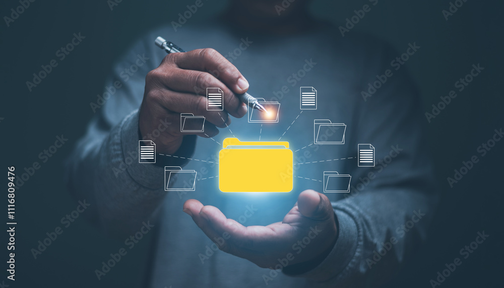 Poster Document management system concept, Businessman holding and using pen point to folder icon for manage information, document sharing, database tech, digital document paperless operation.
