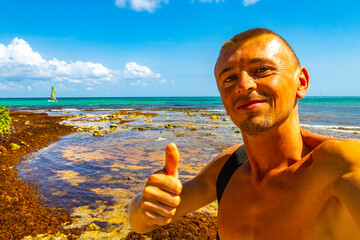 Male tourist Travelling man taking selfie Playa del Carmen Mexico.