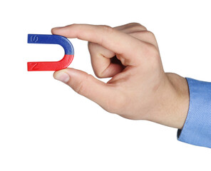 Man with horseshoe magnet on white background, closeup