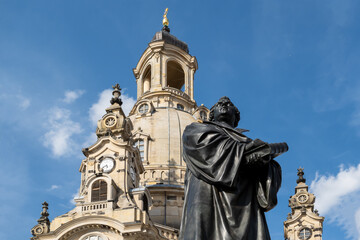 Fototapeta premium Monument to the famous Protestant Reformer Martin Luther in front of the Frauenkirche (Church of Our Lady) in Dresden, Germany