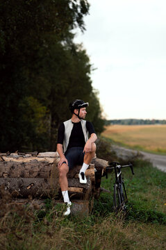 A cyclist is resting