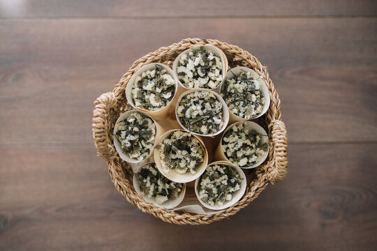 Basket of flower petals arranged in paper cones
