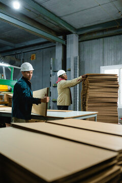 Workers at the paper mill