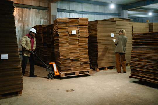 Working in a paper mill warehouse