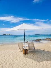 Relaxing beach getaway on Samae San Island in Thailand under a bright blue sky