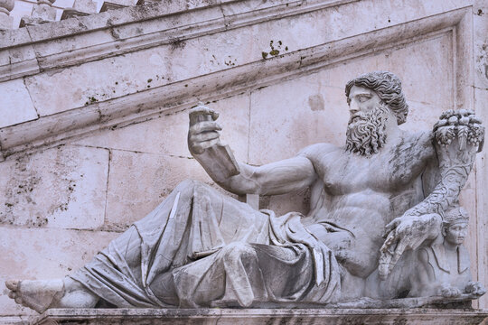Statue of Hapi, The Nile River god. The statues on either side of the double staircase represent the Nile (left) and the Tiber (right), made in the first century AD. Rome, 2017 