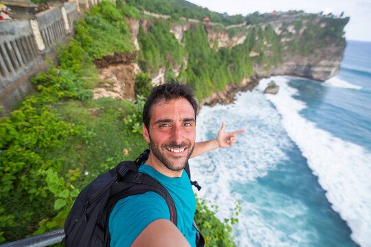 Selfie of Traveler Enjoying Scenic View of Oceanic Cliffs in Nat