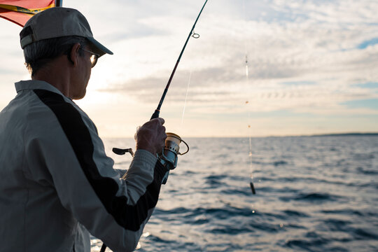 Man fishing at the sea