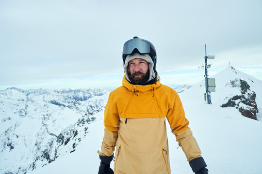 Portrait of a smiling skier in the Alps