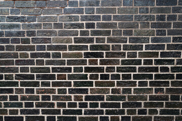 Brick wall concrete background. Stone cladding. Pattern of stonewall. Brick surface.