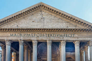 The Pantheon, a building completed by the emperor Hadrian in 126 AD. It is circular with a portico of large granite Corinthian columns; it has the world's largest unreinforced concrete dome. Rome 2017