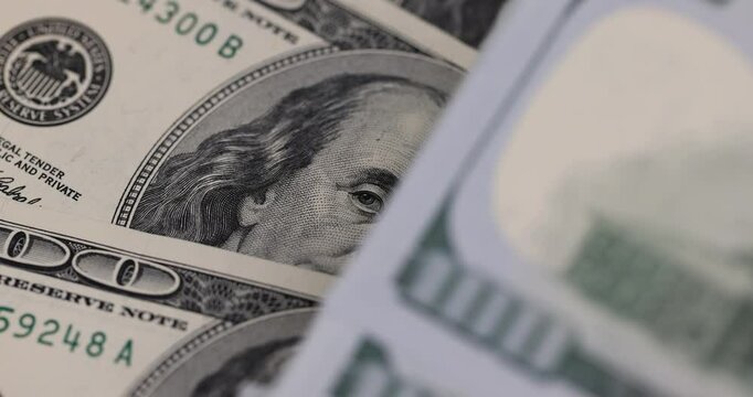 details of the figure 100 face value for US dollars , new American paper money dollars with a face value of one hundred dollars