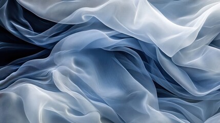 Obraz premium Blue and White Sheer Fabric Draped in Soft Waves