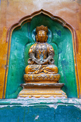 Obraz premium glazed Buddha on the wall of the Wisdom-Sea Temple, The Liangless Buddha Temple at the top of Wanshou Mountain in Summer Palace in Beijing.