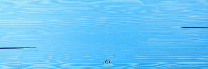 Bright blue wooden surface with smooth texture, perfect for backgrounds or overlays. Ideal for showcasing products or text