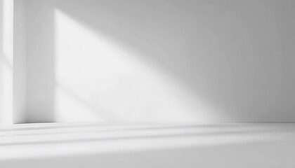 A minimalist interior space with soft shadows and light creating a serene atmosphere.