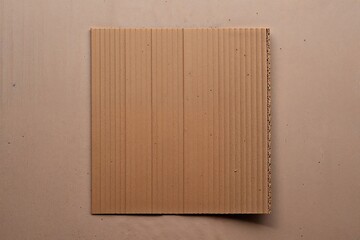 Brown Cardboard Texture Piece Isolated on White Background
