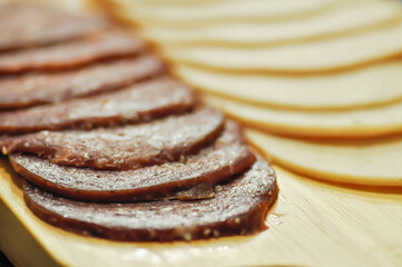 salami and ham , pork sausage or sliced sausage or kulen or kulenova seka
