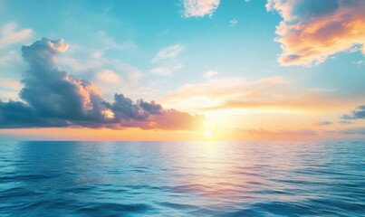 Obraz premium Serene ocean view at sunset with colorful clouds and calm waters.