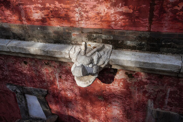 The dragon head on the Tibetan watchtower in the Four Great Regions scenic area of Summer Palace in Beijing.