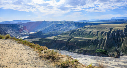 Spectacular Anjihai Grand Canyon natural landscape in Xinjiang. Famous earthquake fault zone scenery in China. mountain faults and canyon with rivers.