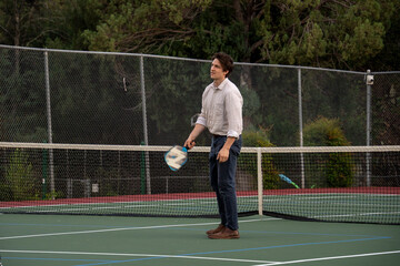 Enjoying a sunny afternoon on the tennis court with friends and laughter