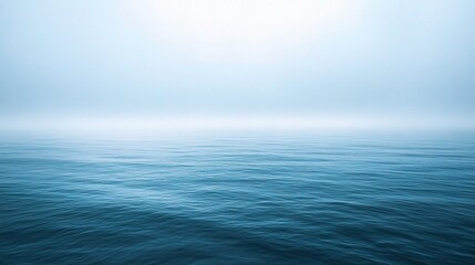 Fototapeta premium Serene Soft Blue Sky Gradient Over Calm Water Surface