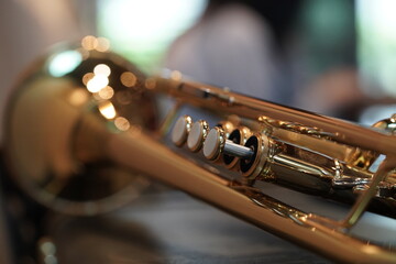 Professional gold Trumpet closeup on valve and pistons