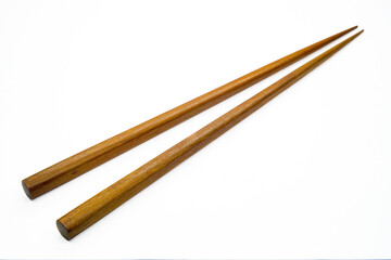 Wooden chopsticks placed on a white background