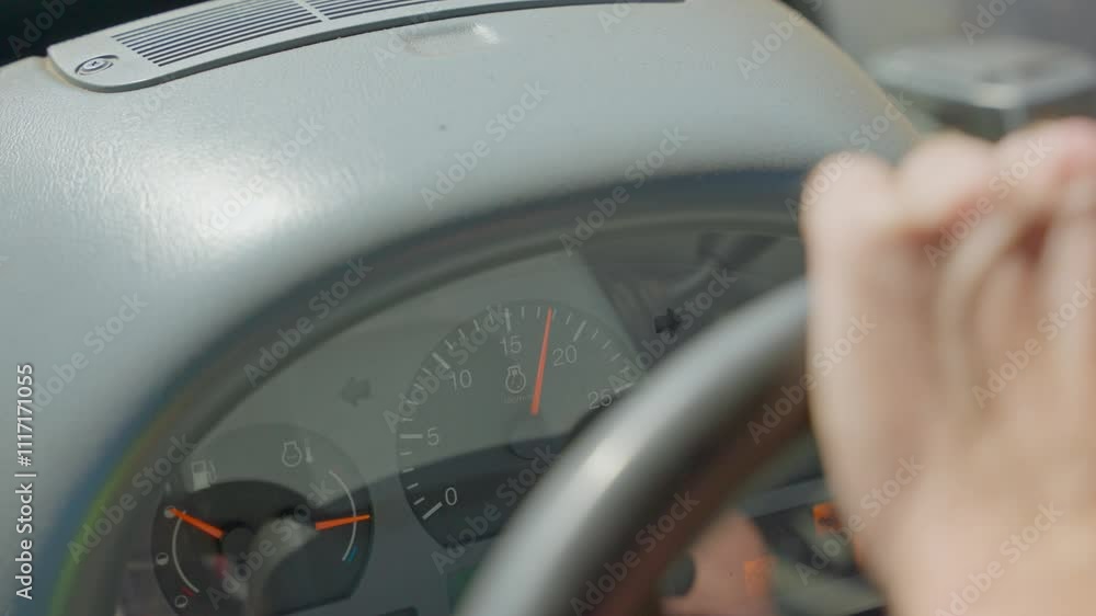 Poster closeup of vehicle controls used for peat harvesting operations, shallow depth of field between stee
