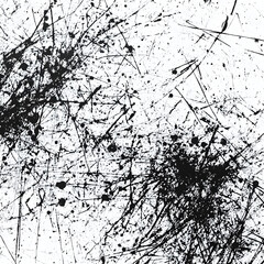 The image is a black and white photo of a messy, splattered surface. The splatters are scattered all over the surface, creating a chaotic and disordered appearance. Scene is one of disorder